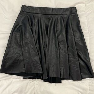 Black faux leather mini skirt (pleated style)
